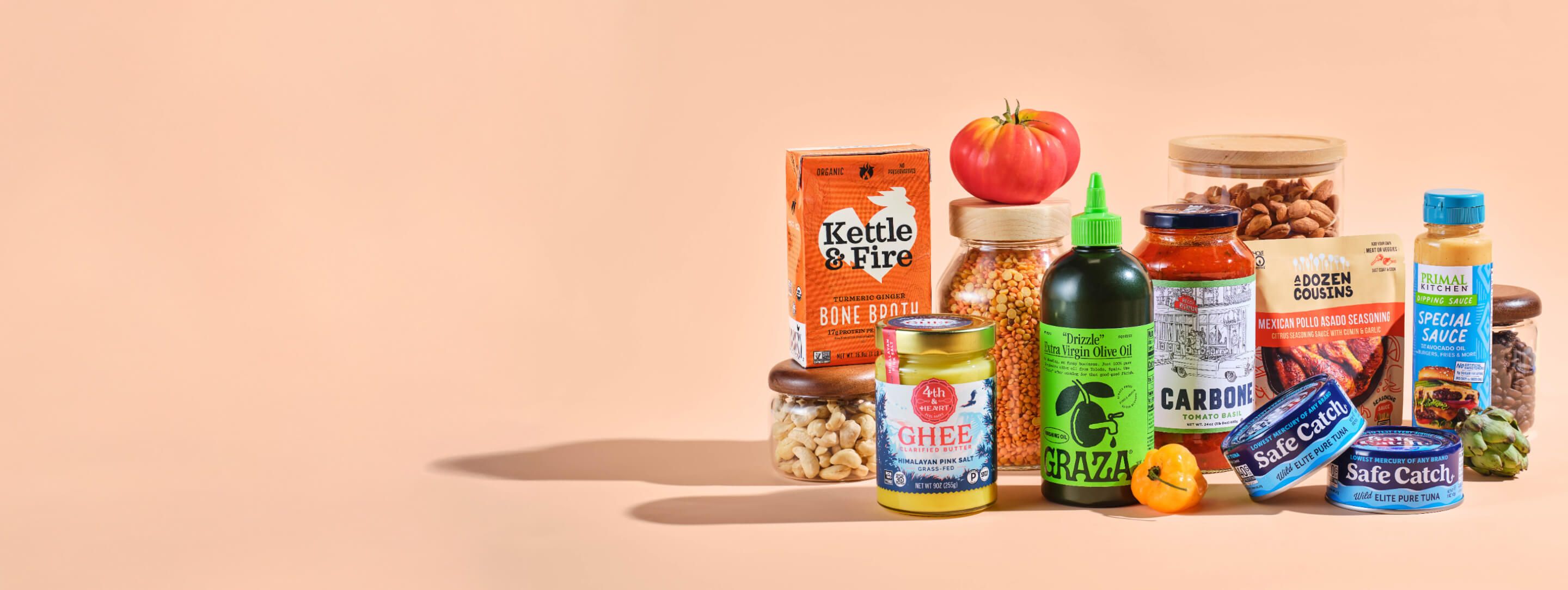 Products available at Thrive Market arranged on a shelf, including dish soap, oat milk, 